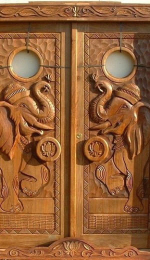Africarve, Hand Carved Doors, Doors & Signs, Hand Carved, Solid Doors, Exotic Doors, South Coast Doors, Woodern Garage Doors, Wooden Signs, Hand Carved Designs, Copper, KIAAT, Grains, Maranti, Oak, RoseWood, Timber, Coastal Doors, Fit Any Size, Custom Doors, Internal Doors, Pivot Doors, Ethnic Doors, Special Projects, Church Furnishing, Religious Doors, Christian Doors, Hindu Doors, Muslim Doors, WildLife Doors, Family Crests, Family Signs, Trophies, Gates, Swing Doors, Headboards, Murals, Cupboard Doors, Solid Custom Tables, Statues, Single Panel Grooved Single & Double, Single Panel Grooved Single & Double Door, Single Panel Sleeper Type Single & Double, Single Panel Plain Single & Double, Two Panel tongue and groove - Single & Double, Two Panel Type Single & Double, 4 Panel Kiaat Door with Centre Piece Carving, 4 Panel Stable Door Design with Glass top panels & Centre Carving, 4 Panel Stable Door Design with Glass top panels & Centre Carving, 4 Panel Stable Door Design with Glass top panels & Centre Carving, 813mm Two Panel with Center Carving, 1,200 Pivot Door Design 50A with cut out for glass. Installed in frame with lock, 1,200 Design 22A. Two Panel, 1,200 Design 7 Abafazi with Copper, 1,200 design 3D Elephant, 3D Elephant - Side View, design 3D 18 Hlala Panzi, kayalangalrg, pumla, hlalaphansi, ilanga, 4panel, galleon, municipality, african-doubledoor, cross-design, floral-design, gheko_sleeper, halfmoon, mixed-wood, shield, silveroak, stabledoor, double door sleeper frame and architrave closed, Custom Wooden Door, Double Doors Design 2 Panel with Carved Wooden Handles Front and Back, Double Doors Design 2 Panel with Carved Wooden Handles Front and Back, Double Doors Design 2 Panel with Carved Wooden Handles Front and Back, Double Doors Design 2 Panel with Carved Wooden Handles Front and Back, church pews, Bishops chairs, Church-christening stand, Carved religious panels, Carved religious doors, PULLPIT, Carved murals, Ganesh-Kiaat, Double Doors-Ganesh, Double Door Lotus Elephant, Ganesha wall mural, Mosque Double Doors in African Rosewood with glass inserts and Top Panel, Carved Mosque Double Doors in Oak with Arched Top Panel, Carved Mosque Double Doors in Oak with Arched Top Panel, Carved religious doors, Dolphin , Elephant & Calf, Big Five, Leopard, Stable Door Kudu, Stable Door Zebra, Perched Eagle, Owl, Perched Fish Eagles, 3D Carved Gecko, 3D Carved Hippo, Rhino, Bush Baby's Paradise, Sailfish Design Doors Kiaat, Cheetah, Dolphin, Elephant Headoor, Big 5 Pivot door 3D, Bester, De Kock, De La Ray, De Jager, Wooden Sign, Kitchen Swing Doors, Saloon Swing Doors, 3m Gate Panels Carved Kiaat, Wooden Gate, Wall Mural, Trophies,, Metre Carved Table Top, Basket Weave, Rope Design, Floral Design, Custom table